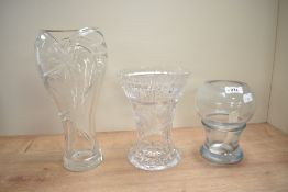 A Stromberqshyttan Swedish glass vase of lobed form, signed to base, h18cm, sold together with two