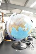 A Melinera illuminating globe, height approx 41cm