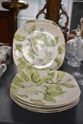 A set of 6 1950s Red Wing plates of oval form, decorated with floral patterns on a magnolia