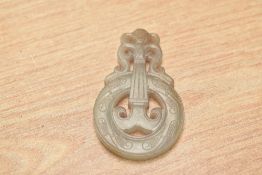 A Chinese carved jade or hardstone pendant / amulet, h5.5cm