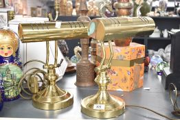 A pair of brass bankers lamps having adjustable top, h30cm