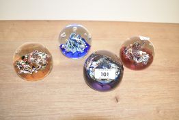 4 Caithness Myriad glass paperweights, h6.5cm