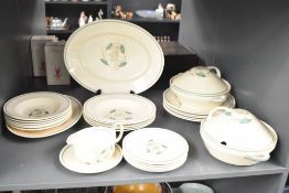 A selection of Susie Cooper Gardenia pattern dinner wares, to include two tureens, bowls, plates,