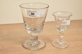 A 19th century bucket bowl glass rummer, h13cm, sold together with another glass