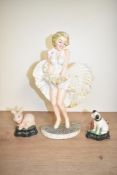 A metal Marilyn Monroe door porter, h33cm, sold together with a rabbit and dog