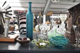 A 20th century Mdina studio glass bowl, w16cm, sold together with a glass bottle and lidded