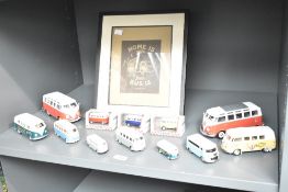 A quantity of Volkswagen models, largest w17.5cm, sold together with a picture frame