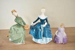 A group of three Royal Doulton bone china figurines comprising 'Rose' HN 2123, 'Janine' HN 2461