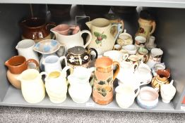 A quantity of pitchers, to include a Royal Doulton pitcher and a W. B & Son. Cobridge pitcher ect