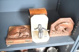 A pair of carved wooden bookends decorated with naive style fox figure, h14cm, sold together with