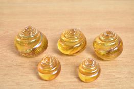 A set of 5 opalescent glass paperweights by Glasform having paper label to base, largest h5cm, (5)