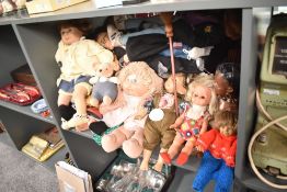 A 20th century cabbage patch kid having pink dress, h33cm, sold together with Harry Potter doll ect