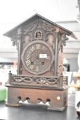 A black forest style carved cuckoo clock, h42cm A/F