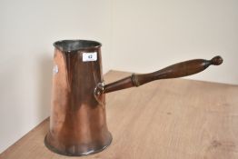 A copper chocolate pot having turned wooden handle, h23.5cm
