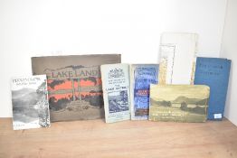 A Lakeland photo album sold together with a Lake District Map and a Derwentwater Holiday Book ect