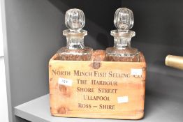 A wooden create having impressed mark for 'North Minch Fish Selling Co', sold together with two