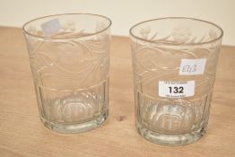 A pair of late 19th / early 20th century glass tumblers decorated with floral patterns, h11.5cm