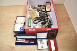 A collection of costume jewellery, including a paste set tiara, brooches, beaded jewellery and