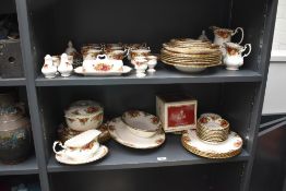 A Royal Albert 'Old Country Rose' pattern dinner service, having gilt edge and decorated with flora