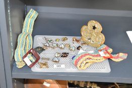 A brass girls guides flag pole plaque, w10cm, sold together with various girl guide pins ect