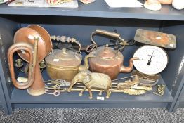 An early 20th century brass and copper bugle, h30cm, sold together with a copper tea pot, a brass