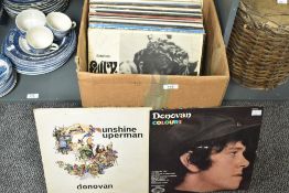 A box containing various records, to include Donovan Colours, Billy Connolly and Classic Rock