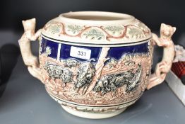 An original Gebz ceramic vase decorated with deer and Boar hunting scenes and having fox handles,