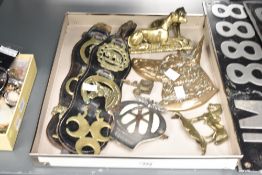 A cast brass German Sheperd wall plaque, h19cm, sold together with a pair of brass horses,