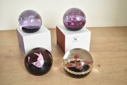 A Caithness glass paperweight, limited edition No '77/500', dated 1976, h7cm, sold together with 3