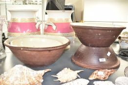 A large pottery bowl, w40cm, sold together with 3 others Condition report: 1 damaged