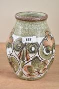 A Denby 'Glyn Colledge' stoneware vase of barrel form, decorated with floral patterns and having