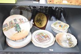 A quantity of Royal Doulton Dickens Ware plates