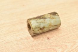 A Chinese carved jade or hardstone pendant / amulet of cylindrical form, h3.7cm
