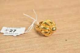 A gold plated costume ring by Kenneth Jay Lane, New York, of cushioned dome form, size L / M