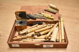 A Mauchline ware box decorated with Dunkeld Cathedral, h5cm, sold together with a quantity of pen