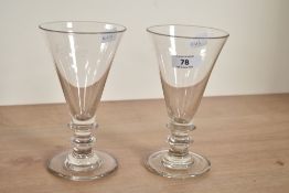 A pair of 19th century Champagne glasses of fluted form, h18cm