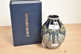 A Moorcroft pottery 'Peacock Parade' pattern vase designed by Nicola Slaney, h13.5