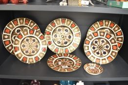 A Royal Crown Derby '1128' pattern plate, w26.5cm, sold together with 6 others