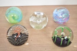 A Caithness 'Maydance' paperweight, no A1492, h7cm, sold together with 4 others