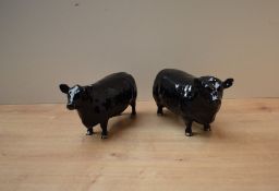 A Beswick Pottery Aberdeen Angus duo comprising Aberdeen Angus Bull model number 1562, Aberdeen