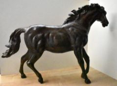 A large brass horse study, measuring 66cm x 99cm, having slight oxidisation in places.