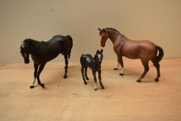 A group of three Beswick Pottery horse studies including 'Stocky Jogging Mare' model number 855 (