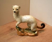 A Beswick Pottery Stoat (In Winter Coat) model number 1021 designed by Arthur Gredington in white
