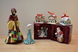 A Coalport bone china figurine 'Heart to Heart, My Wonderful Mum' sold alongside two Royal Albert