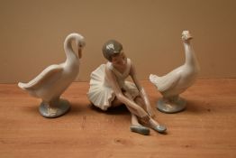 A Nao by Lladro porcelain ballerina figurine sold together with two Nao by Lladro porcelain geese