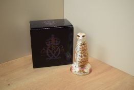 A Royal Crown Derby paperweight 'Meerkat' having Imari style decoration and gold coloured stopper,