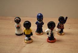 A group of five vintage Carlton Ware ceramic Robertson Jam figures depicting Policeman, Doctor,