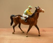 A Beswick Pottery Racehorse and Jockey (Walking Racehorse) model number 1037 in colourway 2,