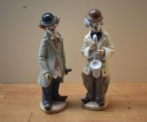 Two Lladro porcelain clown figures 'Sad Sax' model number 5471 and 'Circus Sam' model number 5472.