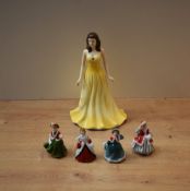 A group of four Royal Doulton bone china miniature ladies collection figurines 'Yuletide Memories'